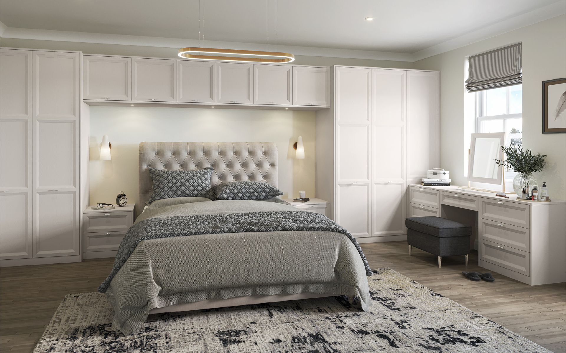 Traditional fitted bedroom furniture surrounding the bed
